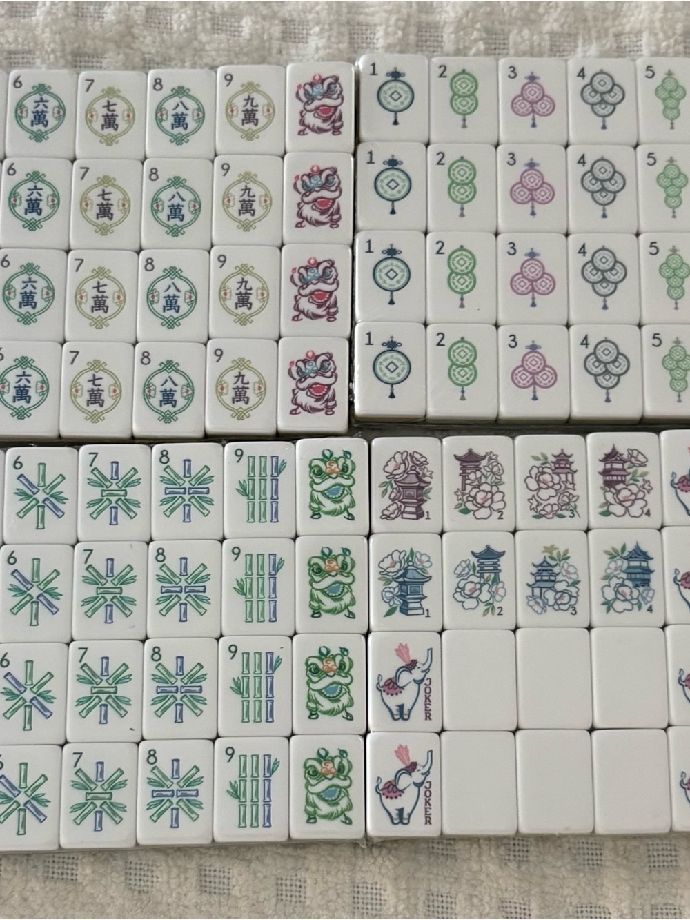 Pale Green Mahjong Tile Set with Green & Purple Accents